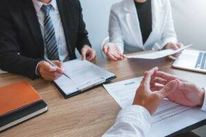 a group of people sitting at a table