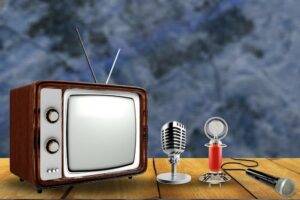a television and a microphone on a table