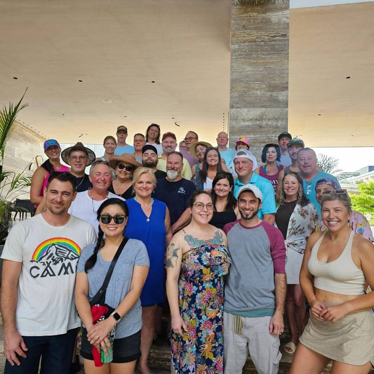 a group of people posing for a photo