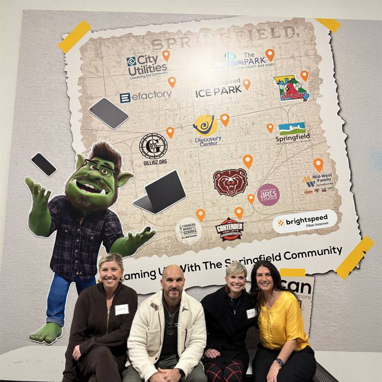 a group of people posing for a picture