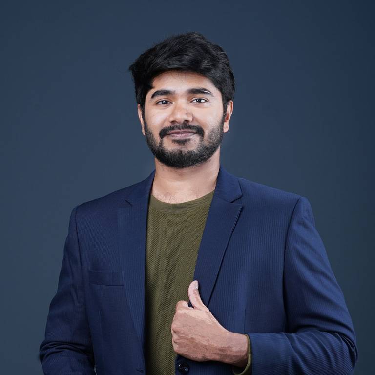 a man in a blue suit